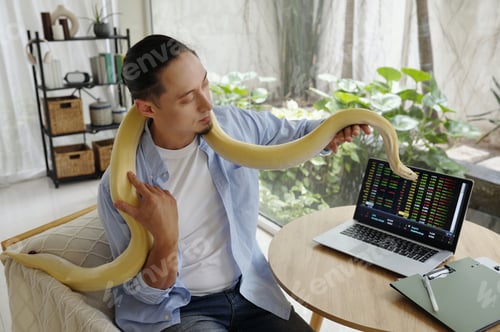 Preview: Enjoying Quality Time With Pet Snake Near Laptop Screen