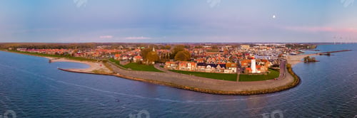 Preview: Lighthhouse of Urk Netherlands during sunset in the Netherlands