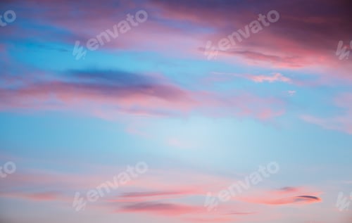 Pink Clouds at Sunset in a Blue Sky
