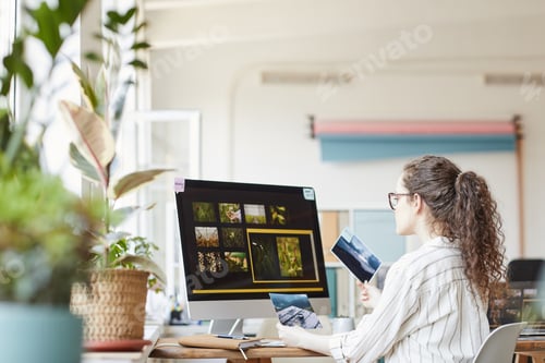 Preview: Female Photographer Setting Up Website