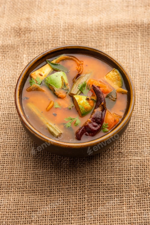 Preview: Bowl of Delicious Sambar Soup on Burlap