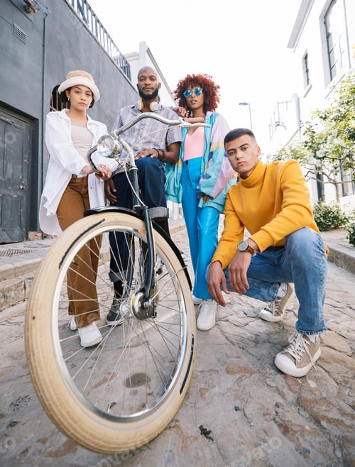 Preview: Friends portrait, bicycle and group outdoor for travel, fashion style and fun with young people in