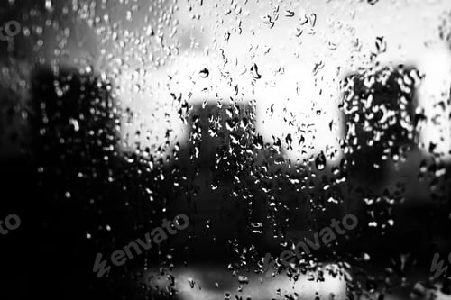Preview: Raindrops on the glass window.black and white tone