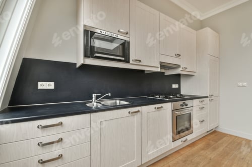 Preview: Spacious bright white kitchen with windows