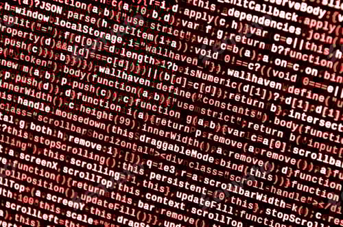 Preview: Writing programming code on laptop