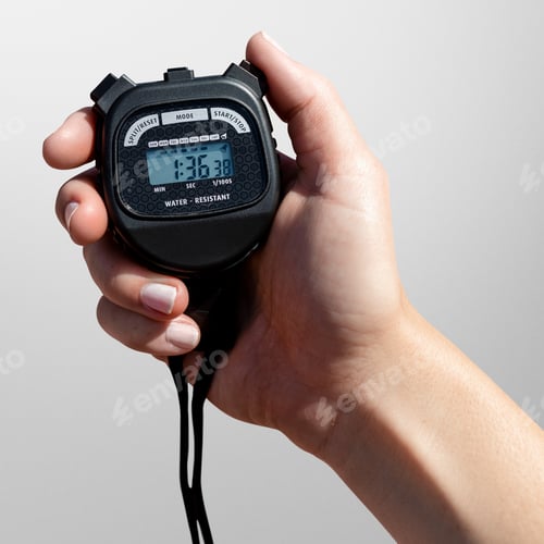 Preview: Person Holding Digital Stopwatch Device for Timing Activity