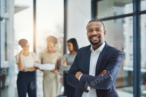 Preview: Cropped shot of a group of businesspeople standing in the office