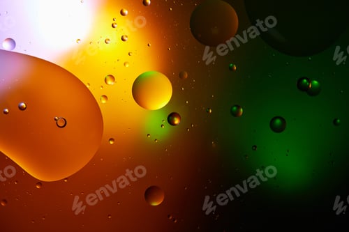 Preview: Beautiful abstract background from mixed water and oil in orange and green