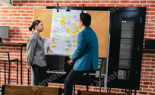 Preview: Professional Colleagues Brainstorming Ideas in a Modern Collaborative Workspace