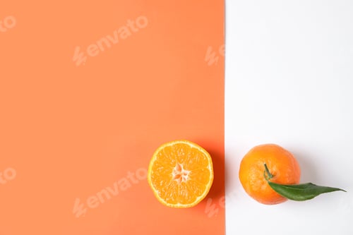 Preview: Flat lay composition with ripe tangerines on color background. Space for text