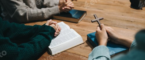 Preview: People reading and study bible in home and pray together.Studying the Word Of God