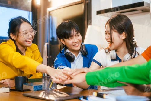 Preview: Five young Asian students study online on campus, collaborating on research, projects.