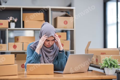 Preview: Stressed Muslim online business owner feeling upset and unhappy about the sale and orders