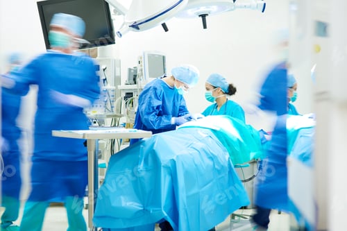 Preview: Surgeon team working together while operation