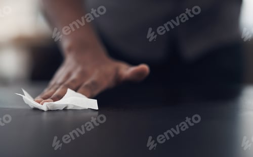 Vista previa: Wiping down his desk to remove all dirt and germs