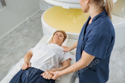Preview: Doctor radiologist comforting a patient before the procedure of MRI or CT or PET Scan