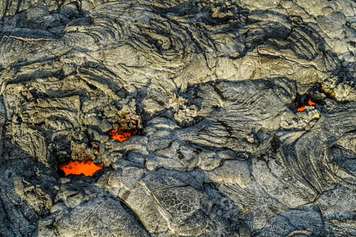Preview: Molten lava glowing near dried lava