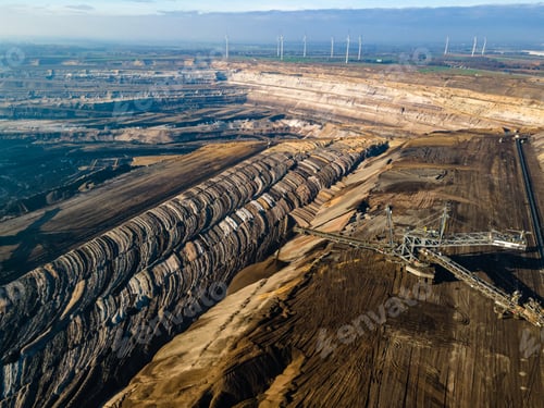 Preview: Mining equipment in a brown coal open pit mine near Garzweiler, Germany. Aerial View