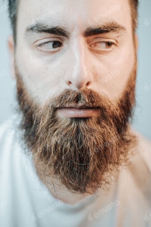 Preview: Portrait of a handsome bearded man, hipster style, serious, colorful, beauty and style