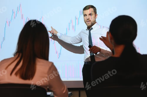 Preview: Businessman does Financial Analysis talks to Group of Businessspeople.