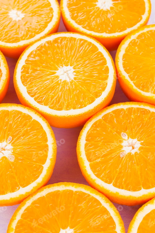 Preview: Background Of Oranges Fruits. Many Halves Of Fresh Oranges, Top View. Citrus For Making Juice. A