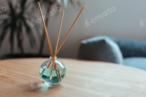Preview: stylish air freshener stands on a wooden table close-up