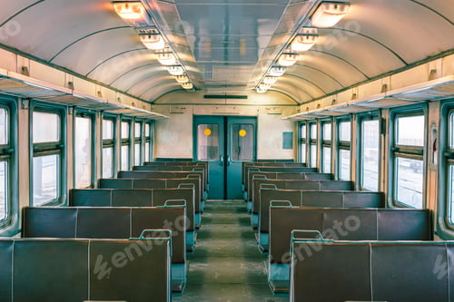 Preview: Empty cabin of old passenger electric train. Empty leather seats train cabin, corridor, no people