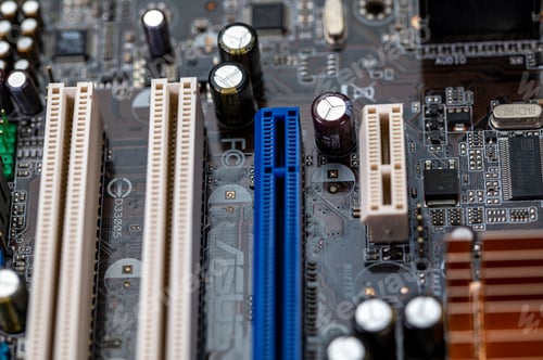 Preview: detail of a motherboard with connectors and heatsinks