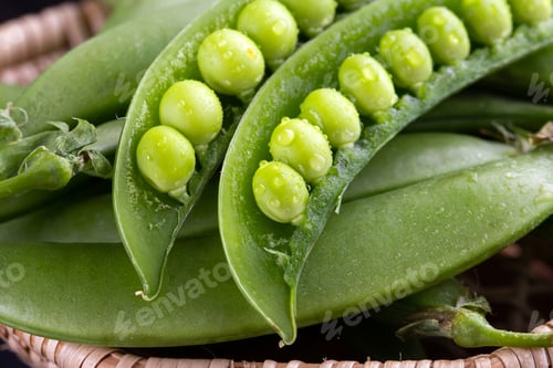 Preview: Sugar snap peas with mint on a rustic wood background
