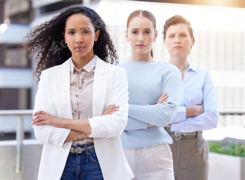 Preview: Crossed arms, serious and portrait of business women in city for collaboration, diversity and unity