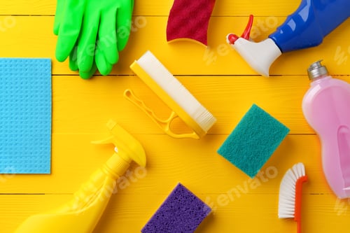 Preview: Cleaning tools composition flat lay on yellow wooden background