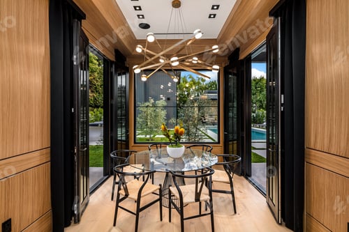 Preview: Modern dining area with garden and pool view
