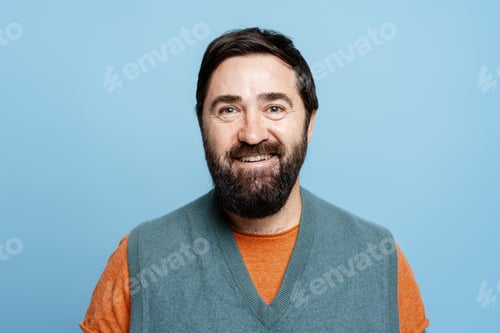 Preview: Confident bearded man expressing joy and positive emotions for a casual portrait
