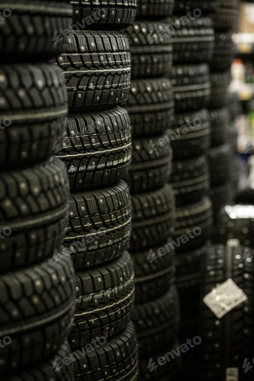 Preview: Sale of car tires for sale in the store. Many new winter tires lie