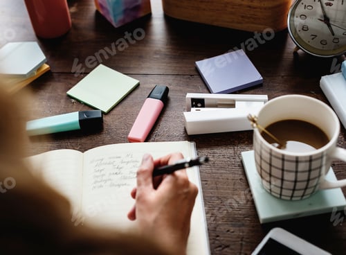 Preview: Caucasian woman writing a note