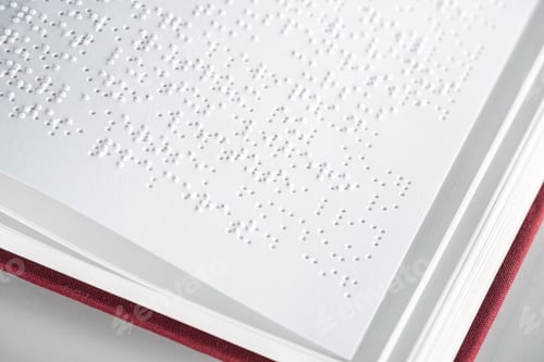 Preview: close up view of book with braille text isolated on grey