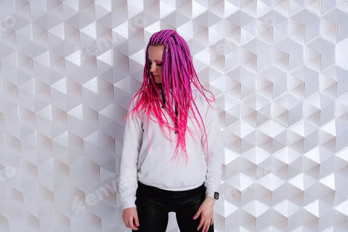 Preview: Beautiful woman with pink hair in white hoodie over futuristic background.