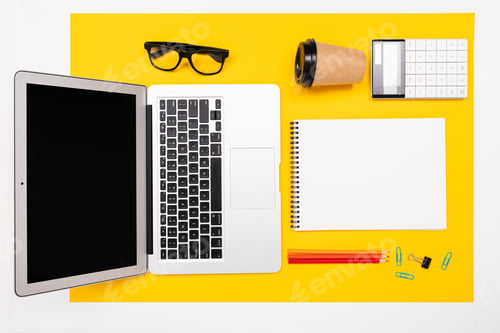 Preview: flat view of the office desk with a creative arrangement of stationery and notebooks for the desktop