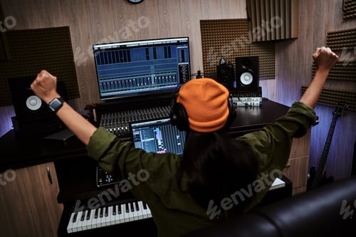 Preview: Successful Music Producer Celebrates in Recording Studio