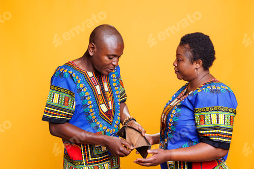 Preview: Man looking in wallet with no money