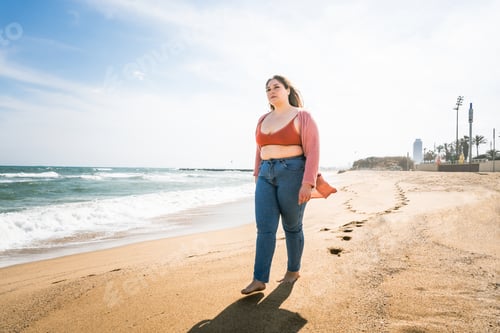 Preview: Beautiful plus size young woman outdoors