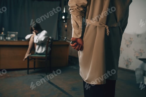 Preview: Psychiatrist with syringe and crazy female patient