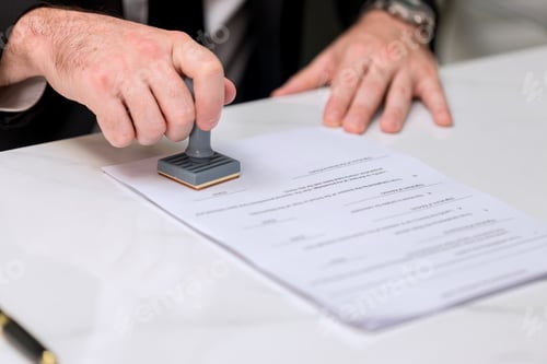 Preview: Business Man Stamping With Approved Stamp On Document. Business approve Stamp and certificate concep