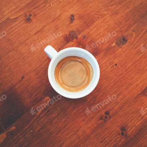 Preview: Coffee Cup with Rich Brew on Wood Surface