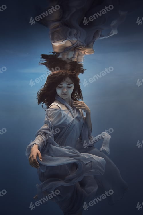 Preview: Portrait Of A Girl In A Blue Dress Under Water
