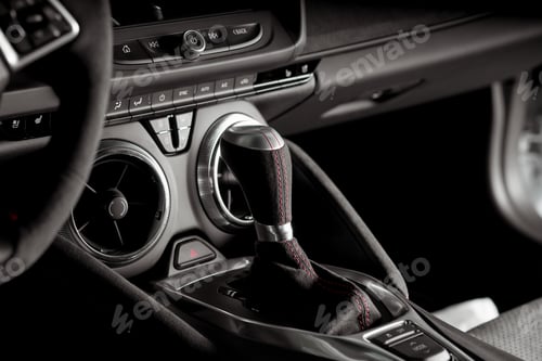 Preview: Closeup shot of a luxurious black car interior