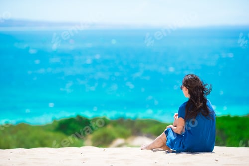 Preview: Young happy woman enjoy summer vacation on white sandy beach
