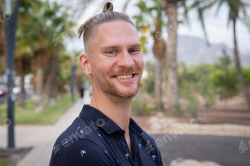 Preview: Portrait of a smiling caucasian boy with a nice haircuts. Positive person with good mood