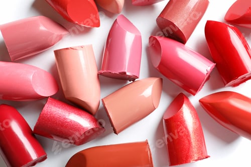 Preview: Collection of lipsticks on white background, top view