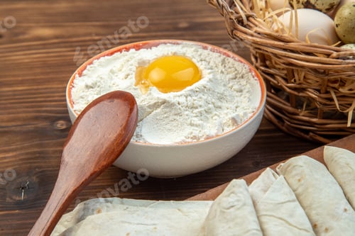 Preview: front close view greens pita rolls with eggs and flour on brown background food meat bake cake